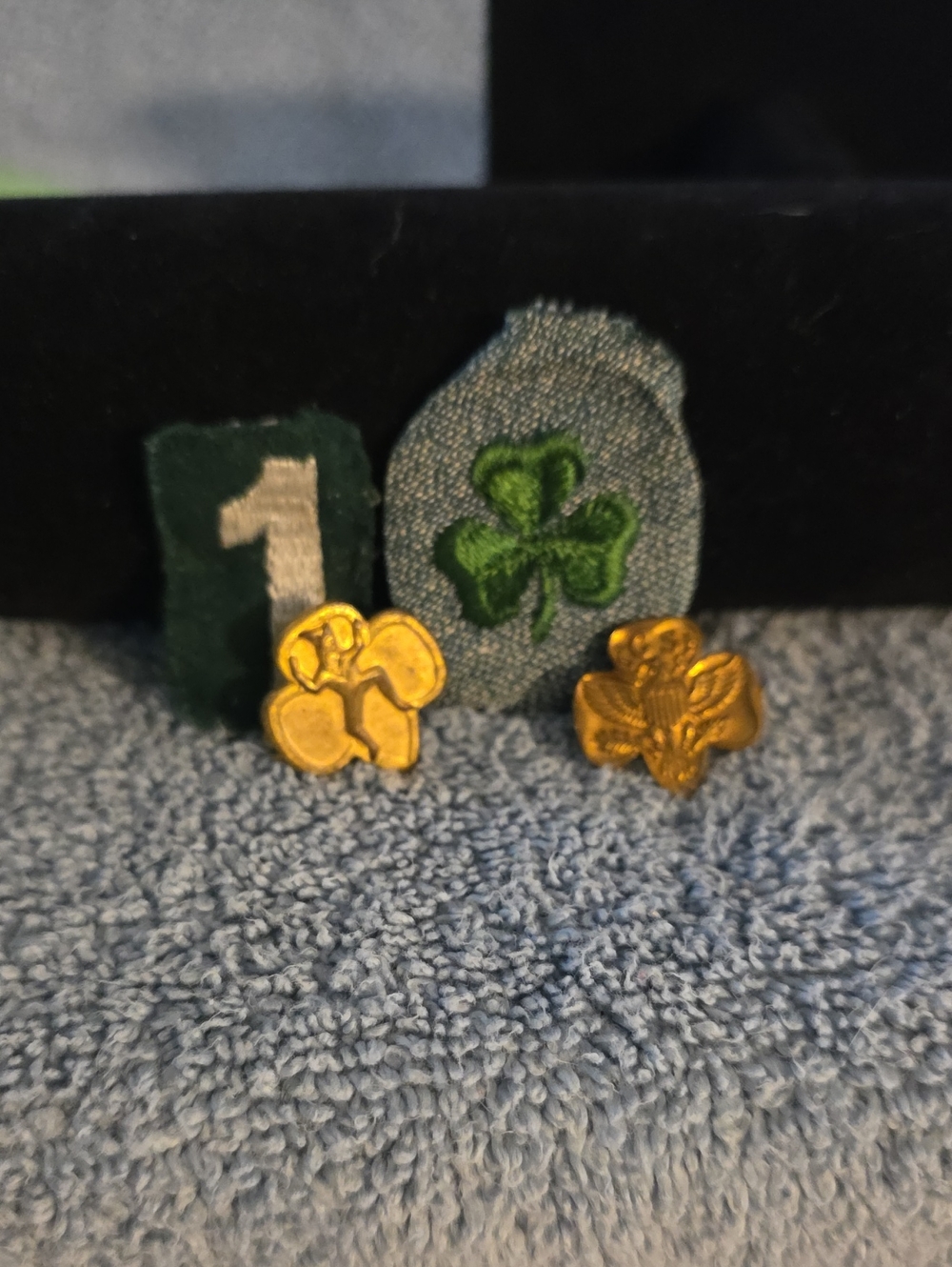 vintage Girl Scouts of America membership pins and rank badges,